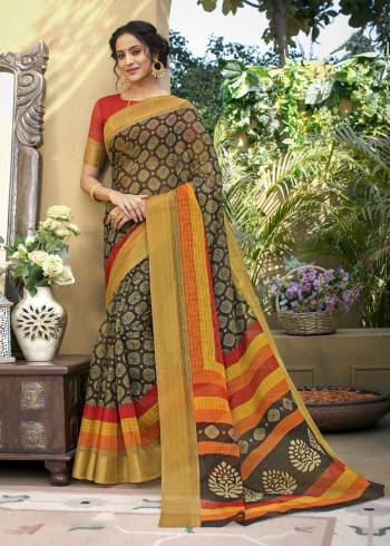 Enhance Your Beauty Wearing This Saree In Black Color Paired With Contrasting Red Colored Blouse. This Saree Is Fabricated On Chanderi Art Silk Paired With Chanderi Art Silk Fabricated Blouse. Buy This Simple And Graceful Saree Now.