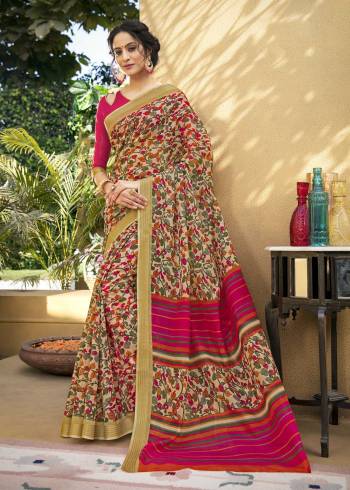 Go Colorful Wearing This Saree In Multi Color Paired With Dark Pink colored Blouse. This Saree And Blouse are Fabricated On Chanderi Art Silk Beautified With Multi Colored Floral Primts All Over It. Buy Now.