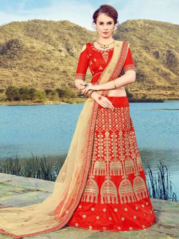 Adorn The Angelic Look Wearing This Designer Lehenga Choli In Red Color Paired With Beige Colored Dupatta. Its Blouse And Lehenga Are Fabricated On Art Silk Paired With Net Fabricated Blouse. Its Fabric Ensures Superb Comfort All Day Long. Buy It Now.