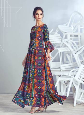 Go Colorful Wearing This Readymade Designer Kurti In Multi Color Fabricated On Crepe Georgette Beautified With Prints. This Long Kurti Is Available In Many Sizes. Buy This Pretty Kurti Now.