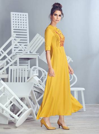 This Summer Beat The Heat With Bright Fresh Colors Wearing This Readymade Kurti In Yellow Color Fabricated On Crepe Georgette. It Has Pretty Thread Work Motif Over The Yoke. Buy This Kurti Now.