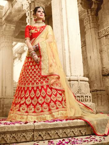 Adorn The Lovely Angelic Look Wearing This Designer Lehenga Choli Red Color Paired With Beige Colored Dupatta. Its Blouse Is Fabricated On Art Silk Paired With Net Fabricated Lehenga And Dupatta. It Has Detailed Embroidery With Jari Making The Lehenga More Attractive. 