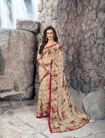 Here Is A Pretty Checks Printed Saree In Beige Color Paired With Beige Colored Blouse. This Saree And Blouse Are Fabricated On Georgette Beautfied With Floral Prints And Checks. Buy This Saree Now.