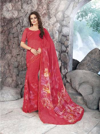 Adorn the Angelic Look Wearing This Saree In Red Color Paired With Red Colored Blouse. This Saree And Blouse Are Fabricated On Georgette. Its Fabrics Are Soft Towards Skin And Easy To Carry All Day Long.