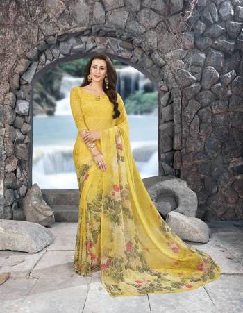 Beat The Heat With this Bright Summer Look Wearing This Saree In Yellow Color Paired With Yellow Colored Blouse. This Saree And Blouse Are Fabricated On Georgette Beautified With Prints. It Is Light Weight And Easy To Carry All Day Long.