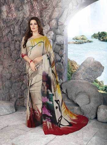 Rich And Elegant Looking Multi Colored Saree Is Here Paired With Beige Colored Blouse. This Saree And Blouse Are Fabricated On Georgette Beautified With Prints All Over It. It Is Suitable For Your Casual Or Semi-Casual Wear.