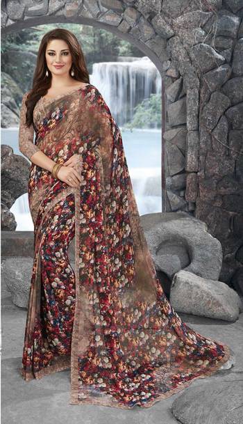 Colors Add Beauty To Any Attire You Wear, So Grab This Multi Colored Saree Paired With Light Brown Colored Blouse. This Saree And Blouse Are Fabricated On Georgette Beautified With Floral Prints All Over It.