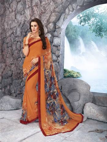 Bright And Visually Appealing Colored Saree Is Here With This Orange Colored Saree Paired With Orange Colored Blouse. This Saree And Blouse Are Fabriacted On Georgette Beautified With Minimal Prints. 