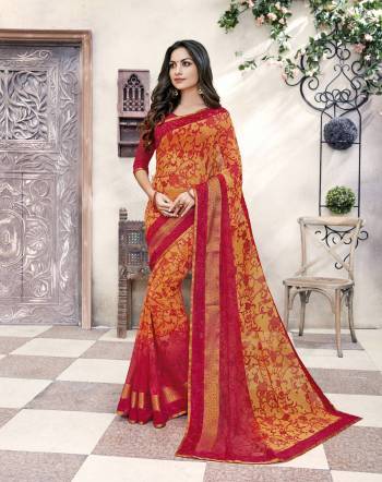 Orange And Red Color Induces Perfect Summery Appeal To Any Outfit, So Grab This Pretty Saree In Orange And Red Color Paired With Red Colored Blouse. This Saree And Blouse Are Fabricated On Georgette Beautified With Prints. 