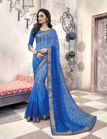 Simple And Elegant Looking Saree Is Here For Your Casual Or Semi-Casual Wear, Grab This Pretty Saree In Blue Color Paired With Blue Colored Blouse. This Saree And Blouse Are Fabricated On Georgette Beautified With Prints. 