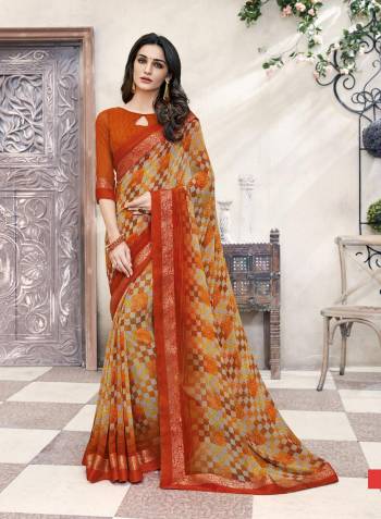 Grab This Simple Saree For Your Casual Or Semi-Casual Wear In Beige And Orange Color Paired With Orange Colored Blouse. This Saree And Blouse Are Fabriacted On Georgette Beautified With Prints. Buy Now.