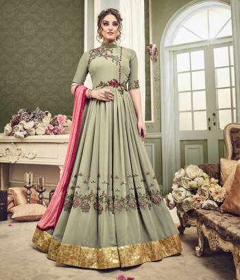 Flaunt Your Rich And Elegant Taste Wearing This Designer Floor Length Suit In New Mint Green Colored Top Paired With Mint Green Colored Bottom And Contrasting Pink Colored Dupatta. Its Top Is Fabricated On Georgette Paired With Santoon Bottom And Chiffon Dupatta. This Suit Has Contrasting Embroidery Which Is Giving An Attractive Look To The Whole Attire.