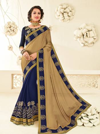 Look attractively Gorgeous and Beautiful after wearing this beautiful beige and Navy Blue Fabricated On  georgette and moss chiffon. look gorgeous at an upcoming any occasion wearing this saree. This saree is designed as per the latest trends to keep you in sync with fashion. Its attractive color and designer embroidered saree, patch design, stone, heavy designer blouse, beautiful floral design work over the attire & contrast hemline adds to the look. Comes along with a contrast unstitched blouse.