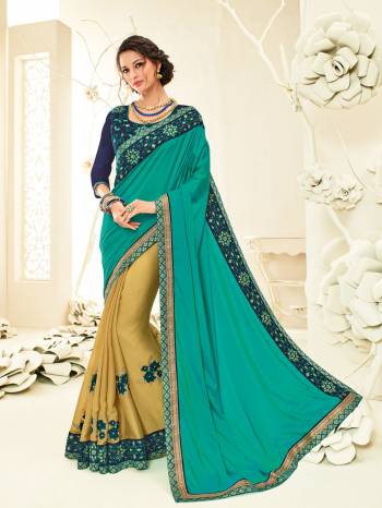 Bring out the best in you when wearing this Blue & Pear Green silk and moss chiffon Saree from Indian women Fashions exudes a lot of class and elegance. look gorgeous at an upcoming any occasion wearing the saree. This saree features a pretty design and is very comfortable to carry all day long. Its attractive color and designer embroidered saree, patch design, stone, heavy designer blouse, beautiful floral design work over the attire & contrast hemline adds to the look. Comes along with a contrast unstitched blouse.