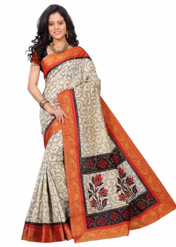 Grab This Pretty Silk Saree For Your Semi-Casual Wear In Cream and Orange Color Paired With Black Colored Blouse. This Saree And Blouse Are Fabricated On Art Silk Beautified With Prints And Lace Border. It Is Durable And Easy To Care For.