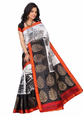 For A Simple, Rich And Elegant Look, Grab This Saree In White And Black Color Paired With Black Colored Blouse. This Saree And Blouse Are Fabricated On Art Silk Beautified With Prints And Lace Border. Buy This Saree Now.