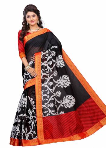 Enhance Your Beauty With This Evergreen Combination Of Saree In Black Color Paired With Red Colored Blouse. This Saree And Blouse Are Fabricated On Art Silk Beautified With Prints and Lace Border. This Saree Is Light Weight And easy To Carry All Day Long.