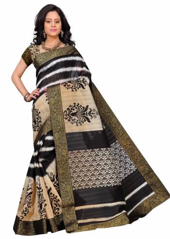 Simple And Elegant Looking Saree Is Here In Black And Beige Color Paired With Beige Colored Blouse. This Saree And Blouse Are Fabricated On Art Silk Beautified With Prints And Lace Border. Buy This Saree Now.