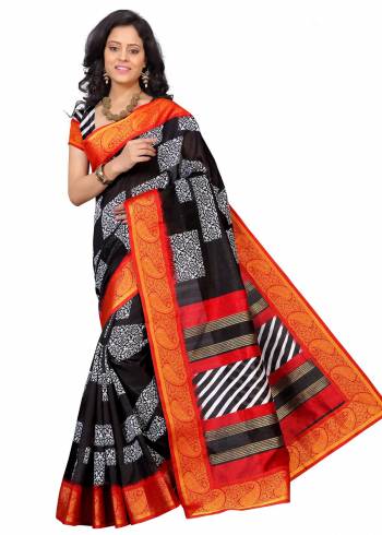 Attract All Wearing This Bright Saree In Black And Orange Color Paired With Black And White Colored Blouse. This Saree And Blouse Are Fabricated On Art Silk Beautified With Prints All Over It. It Is Light Weight, Easy To Drape And Carry All day Long.