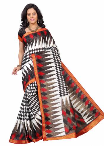 For A Simple, Rich And Elegant Look, Grab This Saree In White And Black Color Paired With Black Colored Blouse. This Saree And Blouse Are Fabricated On Art Silk Beautified With Prints And Lace Border. Buy This Saree Now.