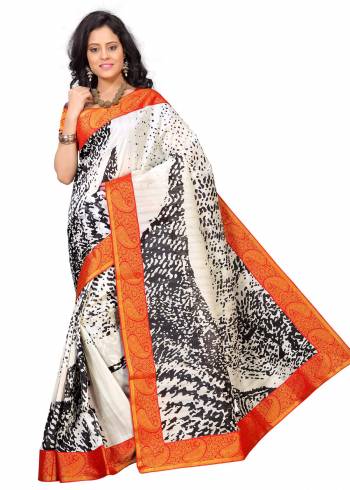 Adorn The Pretty Angelic Look Wearing this Saree In White And Orange Color Paired With Orange Colored Blouse. This Saree And Blouse are Fabricated On Art Silk Beautified With Prints and Lace Border. 