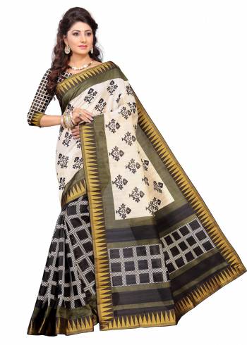 Grab This Pretty Silk Saree For Your Semi-Casual Wear In Cream and Black Color Paired With Black And White Colored Blouse. This Saree And Blouse Are Fabricated On Art Silk Beautified With Prints And Lace Border. It Is Durable And Easy To Care For.