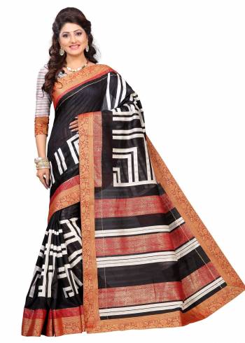 Enhance Your Beauty Wearing this Saree In Black Color Paired With Grey Colored Blouse. This Saree And Blouse Are Fabricated On Art Silk Beautified With Prints and Lace Border. Buy This Saree now.