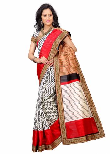 Add This Pretty simple Saree To Your Wardrobe In White Color Paired With White Colored Blouse. This Saree And Blouse are Fabricated On Art Silk Beautified With Prints All Over. This Saree Is Light Weight, Easy To Drape And Carry All Day Long.