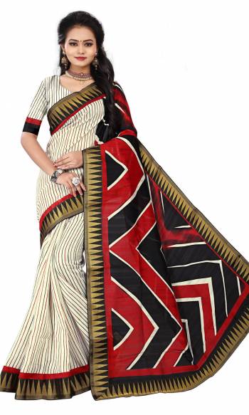 Add This Pretty simple Saree To Your Wardrobe In Off-White Color Paired With Off-White Colored Blouse. This Saree And Blouse are Fabricated On Art Silk Beautified With Prints All Over. This Saree Is Light Weight, Easy To Drape And Carry All Day Long.