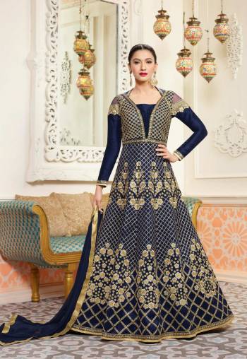 Have A Bold And Beautiful Personality Wearing This Designer Floor Length Suit In Navy Blue Color Paired With Navy Blue Colored Bottom And Dupatta. Its Top Is Fabricated On Art Silk Paired With Santoon Bottom And Chiffon Dupatta. Its Top Has Heavy Embroidery All Over It, Which Will Earn You Lots Of Compliments From Onlookers.