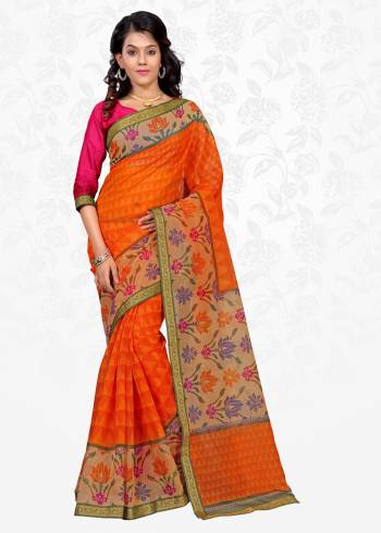 Beat The Heat Wearing This Bright Colored Saree On Orange Paired With Contrasting Dark Pink Colored Blouse. This Saree Is Fabricated On Cotton Silk Paired With Art Silk Fabricated Blouse. It Has Pretty Floral Prints Over The Border. Buy Now.