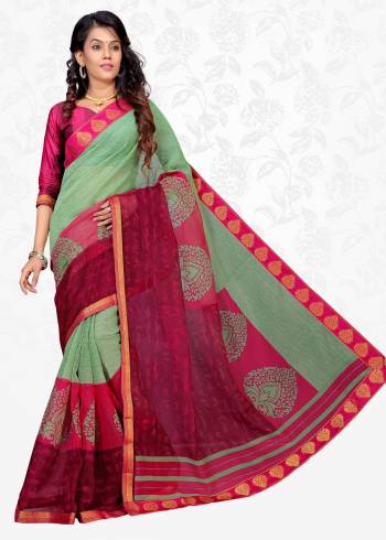 Light And Dark Combination Is One Of The Best, So Grab This Lovely Saree In Pastel Green And Dark Pink Color Paired With Dark Pink Colored Blouse. This Saree Is Fabricated On Cotton Silk Paired With Art Silk Fabricated Blouse. It Is Light Weight And Easy To Carry All Day Long.