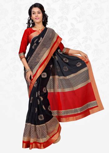 Enhance Your Beauty Wearing This Saree In Black Color Paired With Red Colored Blouse. This Saree Is Fabricated On Cotton Silk Paired With Art Silk Fabricated Blouse. It Is Light Weight, Soft Towards Skin And Easy To Carry All Day Long.