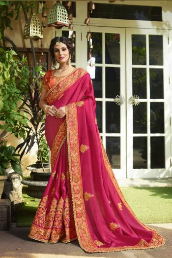 Attract All With This Pretty Saree In Dark Pink Color Paired With Contrasting Orange Colored Blouse. This Saree And Blouse Are Fabricated On Art Silk Beautified With Heavy Embroidery. This Saree Is Easy To Drape And Carry All Day Long. Buy Now.