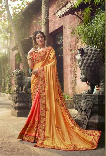 Celebrate This Festive Season Wearing This Designer Saree In Yellow And Orange Color Paired With Contrasting Red Colored Blouse. This Traditonal Color Combination And Heavy Embroidery Will Earn You Lots Of Compliments From Onlookers. 