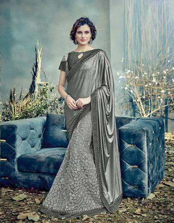 Whats better to make a statement than something subtly sparkly. This silver induced grey lehenga saree is a must-have for summer evening soirees . 