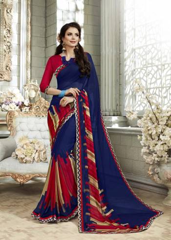 Enhance Your Personality Wearing This Saree In Blue Color Paired With Contrasting Red Colored Blouse. This Saree Is Fabricated On Georgette Paired With Art Silk Fabricated Blouse. It Is Beautified With Bold Prints Making The Saree Look Elegant.