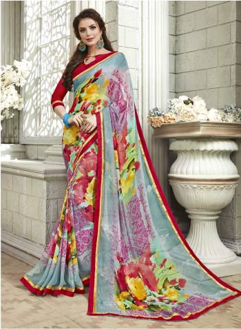 Go Colorful With This Saree In Multi Color Paired With Contrasting Red Colored Blouse. This Saree Is Fabricated On Georgette Paired With Art Silk Fabricated Blouse. It Is Beautified With Floral Prints All Over It. Buy Now.