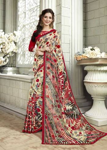 Go Colorful With This Saree In Multi Color Paired With Contrasting Red Colored Blouse. This Saree Is Fabricated On Georgette Paired With Art Silk Fabricated Blouse. It Is Beautified With Floral Prints All Over It. Buy Now.