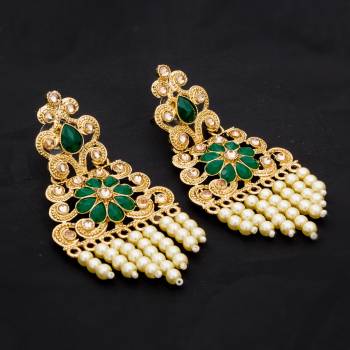 Enhance Your Look With This Lovely Pair Of Earring With Your Silk Saree. This Set Of Earrings In Light Weight And It Will Definitely Earn You Lots Of Compliments.