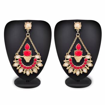 Trendy Set Of Earring Is Here With Pair Of Earring In Golden Color Beautified with Red Colored Stones. This Is Also Indo-Western Can Be Paired With A Simple Kurti Or Heavy Dress.