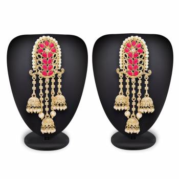 For That Lovely Pink Dress, Grab This Pretty set Of Earrings In golden Color Beautified With Pink Stone Work. Pair This Up With Your Pink Or Any Contrasting Colored Traditonal Attire.