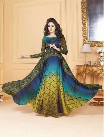 You Will Definitely Earn Lots Of Compliments Wearing This Designer Readymade Gown In Shades Of Blue And Yellow Fabricated On Tussar Art Silk Beautified With Digital Prints. This Gown Is Available In Many Sizes And Thus Ensures Superb Comfort Throughout The Gala.