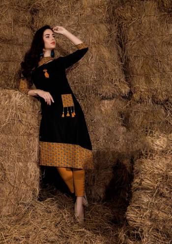 Enhnace Your Beauty Wearing This Designer Kurti In Black Color Fabricated On Rayon Cotton Beautified with Prints And Lovely Pattern. This Kurti Is Light Weight And Easy To Carry All Day Long.