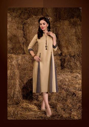 Simple And Elegant Looking Readymade Kurti Is Here In Beige Color Fabricated On Rayon Cotton Beautified With Prints All Over. This Kurti Is Light In Weight And Easy To Carry All Day Long.