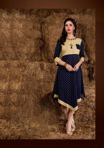 Here Is A Yoke Patterned Kurti In Navy Blue Color Fabricated On Rayon Cotton Beautified With Prints All Over It. Buy This Kurti Now.