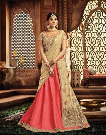 As regal as it gets, this lehenga in the most subtle tone of Pink and cream is an absolute royal-delight. Go subtle on your jewels or dress-up like a queen, you're meant to look gorgeous. 