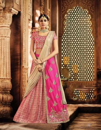 Turn into a stunning showstopper in your next celebratory soiree and flaunt this vivacious pink lehenga looking nothing less than a diva. 