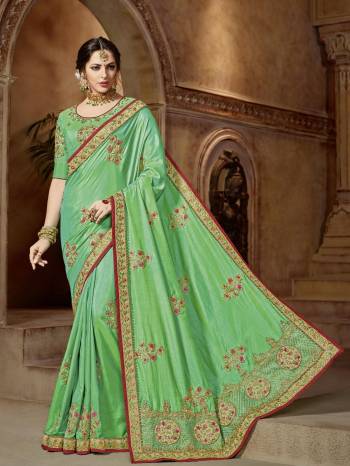 Presenting This Sea green color two tone silk saree. Ideal for party, festive & social gatherings. this gorgeous saree featuring a beautiful mix of designs. Its attractive color and designer embroidered design, patch design, stone, beautiful floral design work over the attire & contrast hemline adds to the look. Comes along with a contrast unstitched blouse.