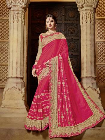 Impress everyone with your amazing Trendy look by draping this Dark Pink color two tone silk saree. this party wear saree won't fail to impress everyone around you. this gorgeous saree featuring a beautiful mix of designs. Its attractive color and designer embroidered design, patch design, stone, beautiful floral design work over the attire & contrast hemline adds to the look. Comes along with a contrast unstitched blouse.